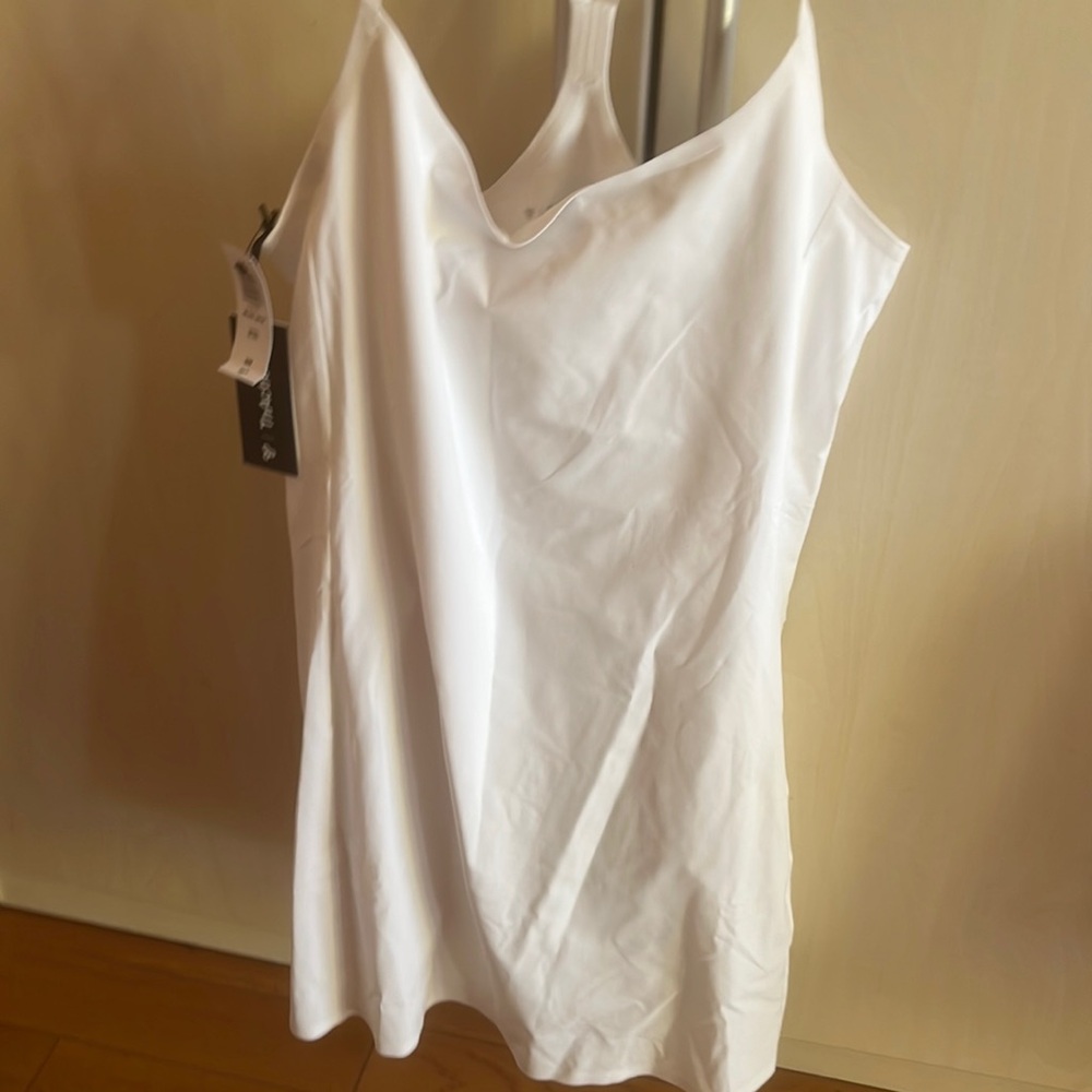 Brand new with tags Aritzia tennis dress in white.